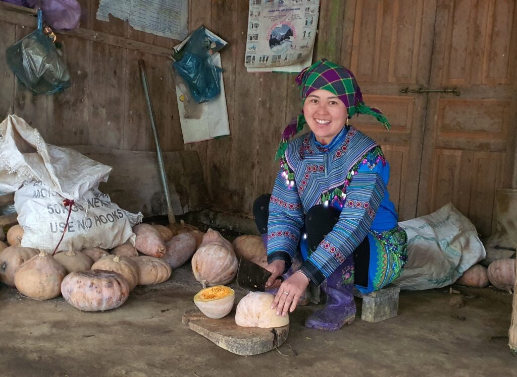 GREAT project beneficiary working at home in Ta Van Chu commune, Vietnam